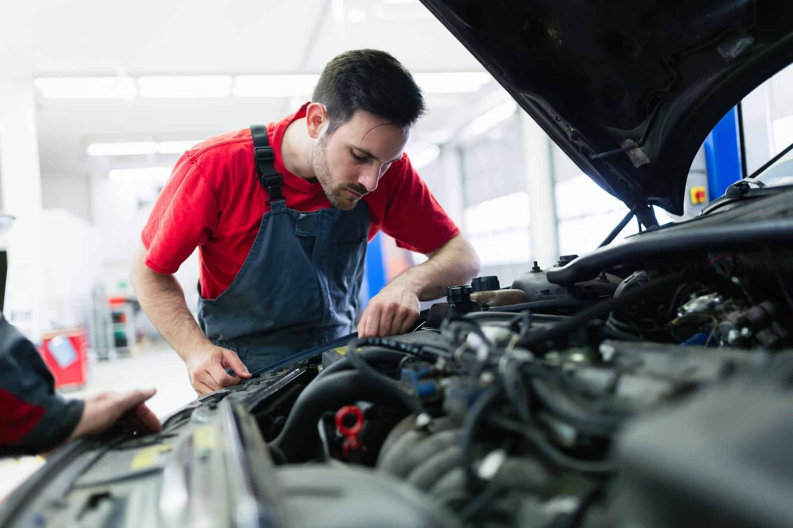 Mechanic working at an automotive service centre